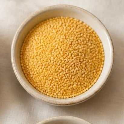 Foxtail Millet (Kangni / Thinai) in a ceramic bowl